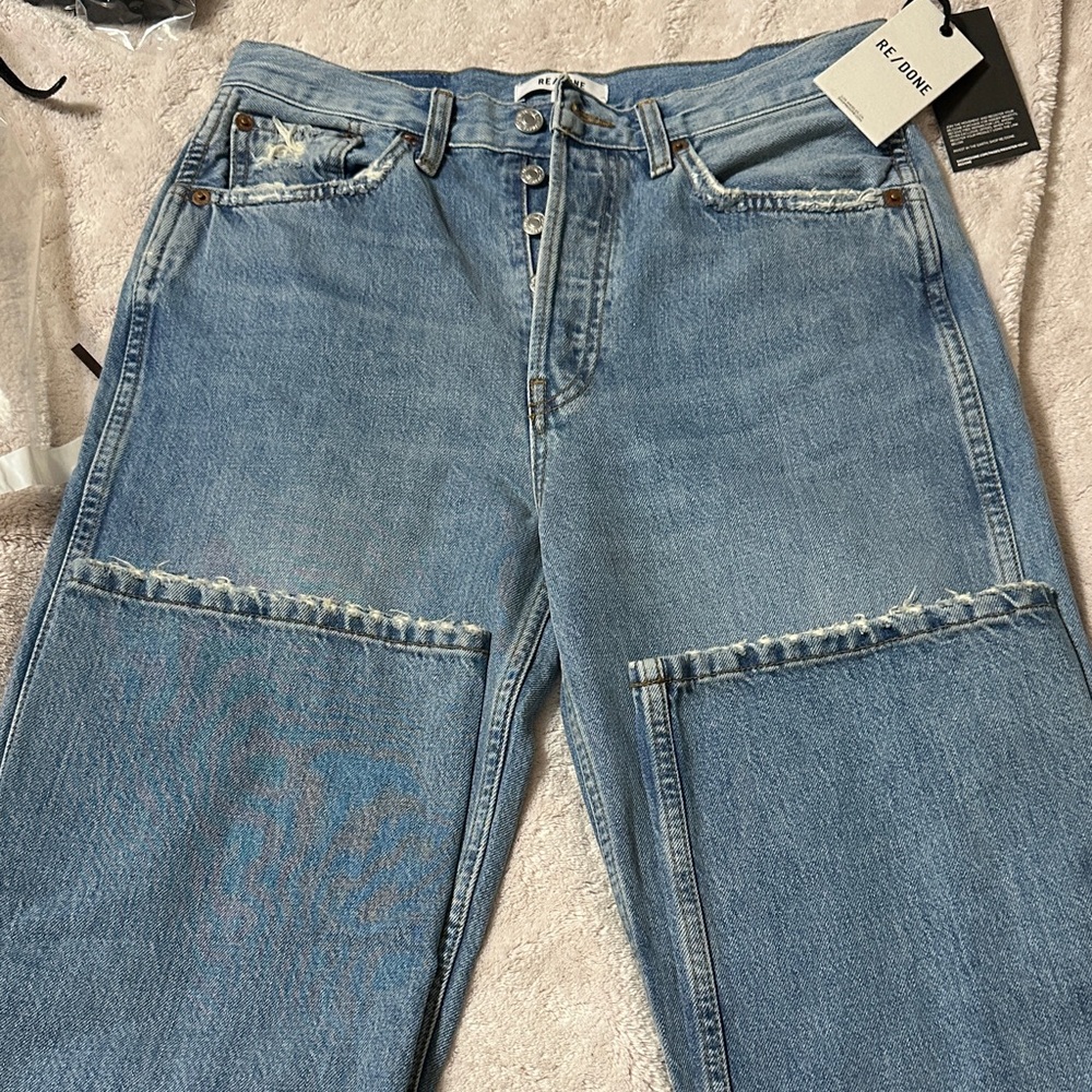Re/Done Women's High Rise Light Blue Distressed Patch Jeans